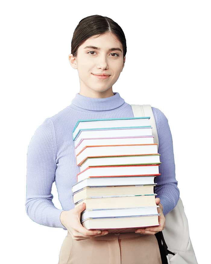 A woman holding a stack of books in her hands.